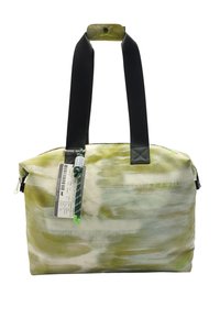 Zielona i kremowa torba na ramię w wzory, z czarnymi ramiączkami i zamknięciem na zamek. Zawiera metkę oraz dekoracyjny uchwyt z zielonym akcentem.