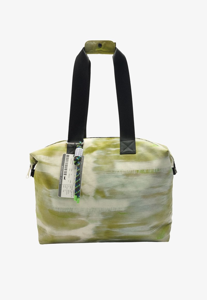 Zielona i kremowa torba na ramię w wzory, z czarnymi ramiączkami i zamknięciem na zamek. Zawiera metkę oraz dekoracyjny uchwyt z zielonym akcentem.