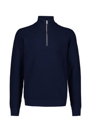 Granatowy sweter z długim rękawem z teksturowanej tkaniny i krótkim srebrnym zamkiem błyskawicznym przy wysokim kołnierzu.