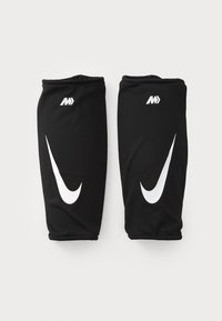 Zwarte sportmouwen van ademend meshmateriaal. Voorzien van een opvallend wit Nike-logo en een gladde textuur met elastische manchetten.