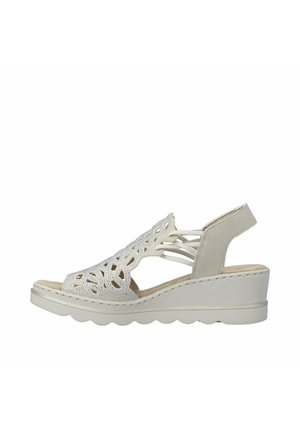 Beige sleehak sandaal met open teen, decoratieve uitsnijding aan de bovenkant, elastische zijkleppen en een comfortabele gevoerde zool.