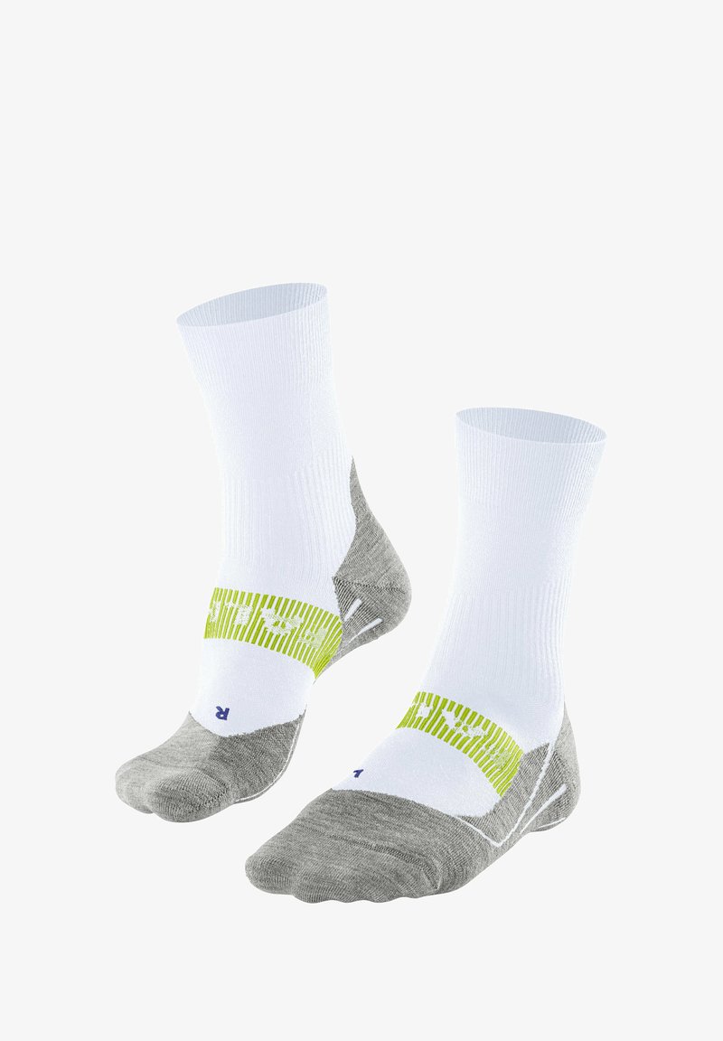 Calze sportive grigie e bianche con una texture a coste, dotate di una striscia verde con un logo che attraversa la parte centrale del piede e zone della punta rinforzate.