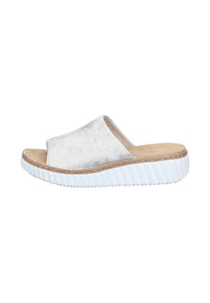 White slide sandal with cushioned sole, textured midsole edge, and wide soft upper strap for casual wear.