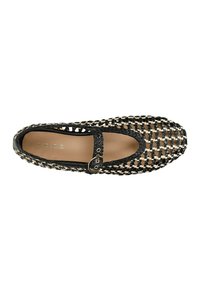 Woven black and beige flat shoe featuring a round toe, an adjustable strap with a silver buckle, and a textured upper design.