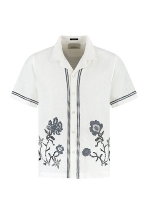 Hvid kortærmet skjorte med knapper og sort blomsterbroderi på fronten, sorte syninger langs knapstolpen og ærmekanter.