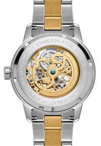 Automatisk klocka med armband i rostfritt stål och guldton. Transparent baksidan visar den intrikata mekanismen av guld och silver.