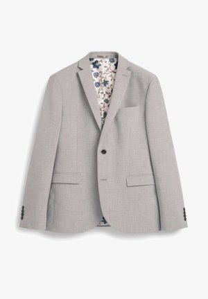 Helehall blazer, millel on lõigatud krae, kaks eesmist taskut ja üks rinnanäpp. Lilleline vooder sisaldab siniseid ja punaseid aktsente.