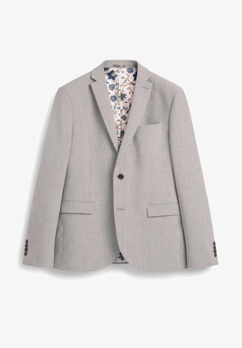 Blazer grigio chiaro con rever a punta, due tasche frontali e una tasca sul petto. Fodera a motivi floreali con accenti blu e rossi.