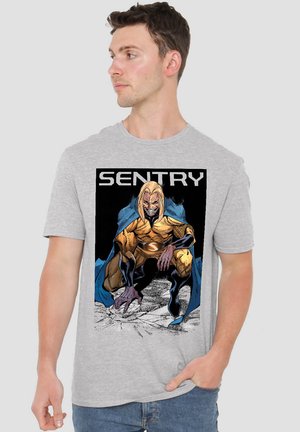 Gray short-sleeve t-shirt displaying a comic book illustration of Sentry, featuring bold black and yellow colors and graphic details.