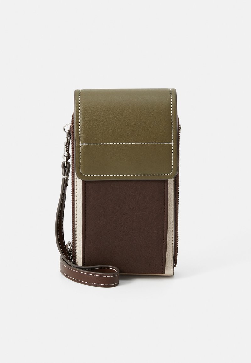 Green and brown crossbody bag with a flap closure, zipper, and a textured finish. Features white stitching and a detachable strap.