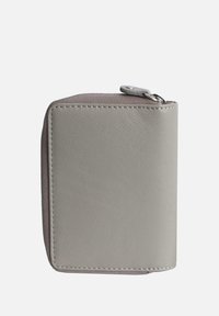 Gray leather wallet with a textured, lighter gray fabric accent. Features rounded edges, a zip closure, and visible stitching details.