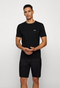 BOSS TEE CURVED - T-shirt basic - black