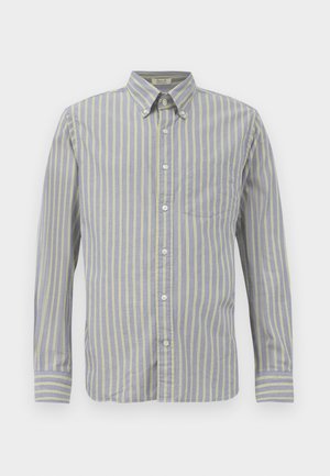 Button-up shirt in blue fabric with thin yellow stripes, featuring a collar, long sleeves, and a chest pocket. Finished with white buttons.
