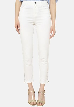 Witte katoenen blend enkeljeans met een aansluitende pasvorm, voorzien van zijritsen aan de hem en een klassieke vijf-pocketontwerp.