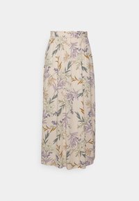 Jupe midi florale en tissu beige clair avec taille élastique, ornée d'imprimés botaniques violets, oranges et verts, et d'une silhouette fluide.