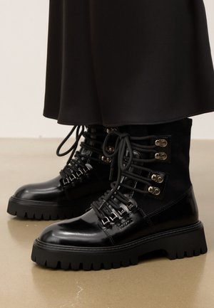 SAOLIA - Platform bokacsizmák - black
