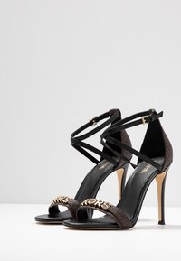 Michael Michael Kors Goldie Single Sole Sandali Con Tacco Black Brown Nero Zalando It
