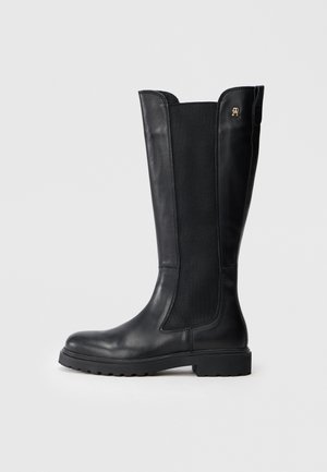 TH CLEATED LONG - Saappaat - black