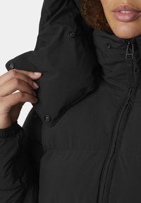 Helly Hansen ELLIE PUFFY PARKA - Abrigo de invierno - black