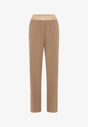 Pantalon beige à jambes droites avec ceinture élastique et détails de couture subtils le long du centre avant.