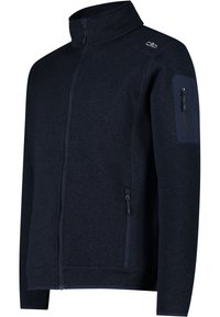 Veste bleu marine à fermeture éclair intégrale, col montant, poches latérales zippées et poche zippée sur la manche gauche.