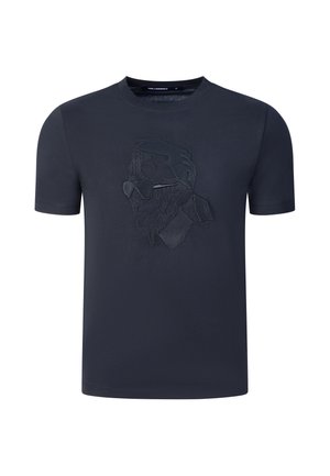 Schwarzes T-Shirt mit kurzen Ärmeln, das ein strukturiertes geometrisches Porträt einer Person mit Sonnenbrille und Pferdeschwanz auf der Vorderseite zeigt.