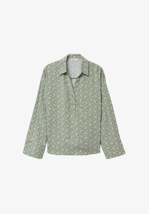 Vihreä pitkähiha-paita, jossa on kukkakuvio, kauluksellinen pääntie, napillinen etukiinnitys ja pehmeä kangas. Kevyt ja väljä istuvuus.