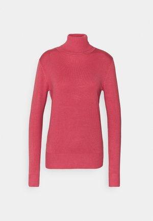 Pull à col roulé ajusté en rose vif. Texture tricot lisse, manches slim, et détails côtelés au niveau des poignets et de l'ourlet. Pas de motifs visibles.