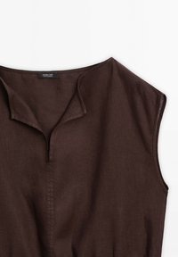 Dark brown linen top with a collarless design, short sleeves, and a button-front placket. Smooth texture with minimal stitching detail.