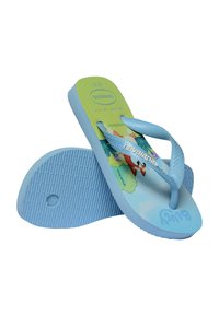 Paire de tongs Havaianas bleu clair avec un renard cartoon et un motif nature sur la semelle intérieure, semelle texturée et brides marquées.