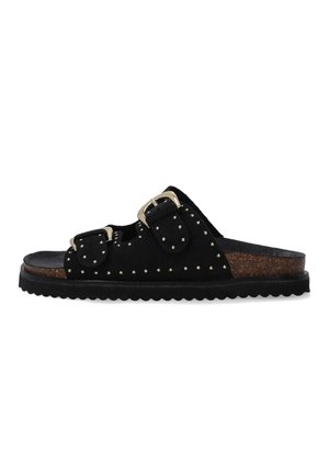 Black suede slide sandal featuring two adjustable buckles, studded detailing, and a textured cork footbed with a ridged rubber sole.