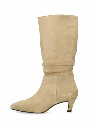 Beige suede mid-calf boot with a slouchy shaft, pointed toe, and a low kitten heel.