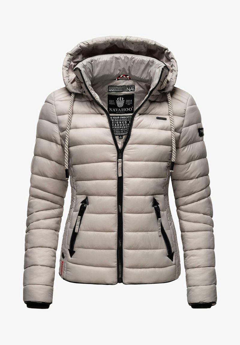 Padded jacket in light gray with a hood, featuring black zippered pockets and a drawstring hood. Textured shell with horizontal stitching.