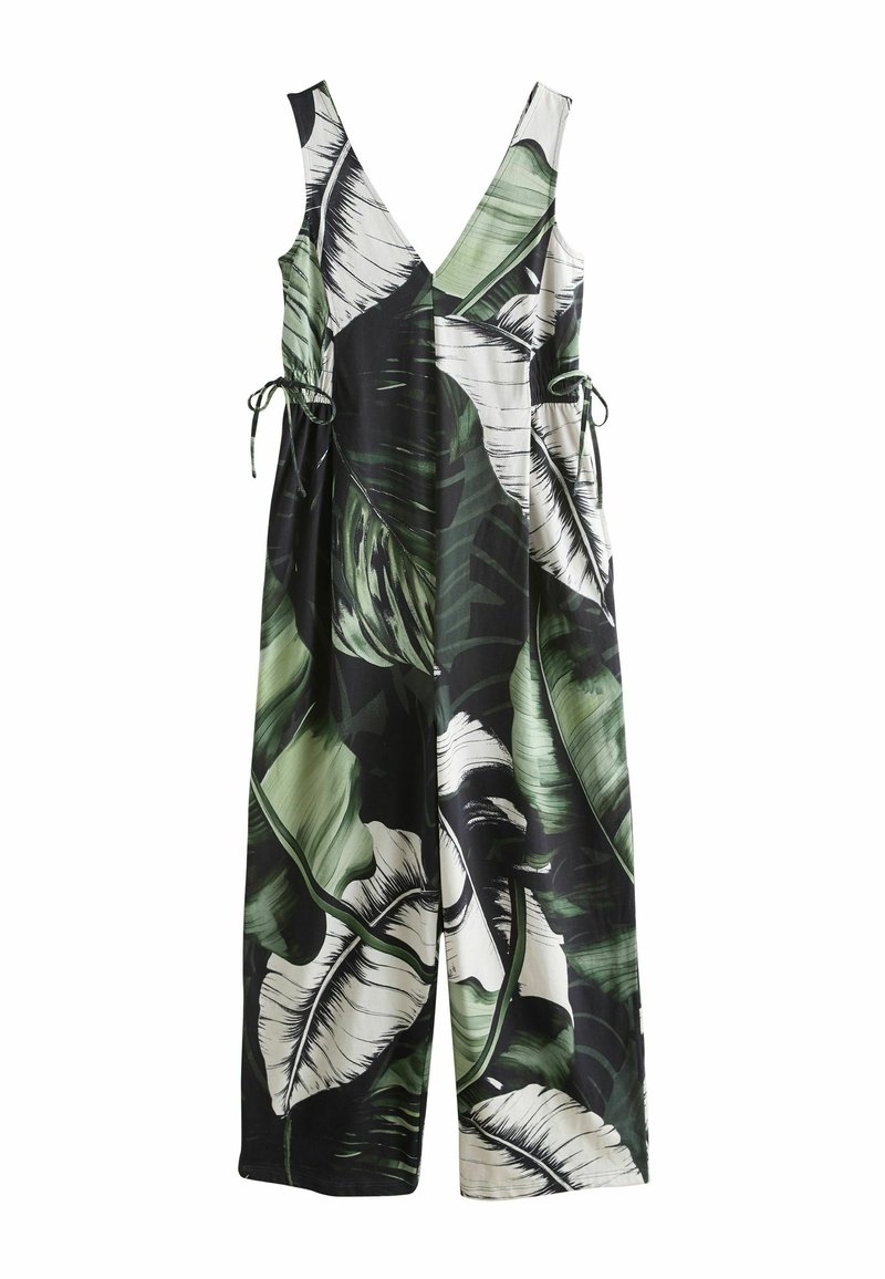 Salopetă verde și neagră, cu decolteu în V, decorată cu modele mari, albe, de frunze tropicale. Accesorizată cu șnururi de strângere în talie.