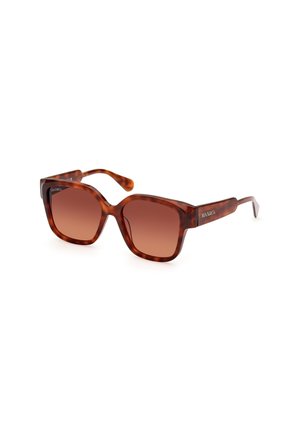 Lunettes de soleil en écaille de tortue avec des montures carrées, des verres dégradés bruns et une finition brillante. Dotées de branches fines avec des accents de logo.