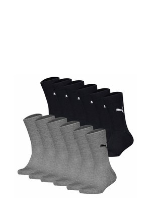 Zehn Paar Puma-Socken bis zur Mitte der Wade, fünf schwarz und fünf grau, jeweils mit einem kleinen Puma-Logo in Knöchelnähe.