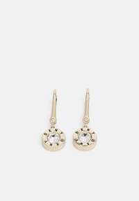 Boucles d'oreilles dorées avec un charme circulaire au centre orné d'une pierre précieuse transparente et "DKNY" gravé tout autour. Fermoir à levier simple.