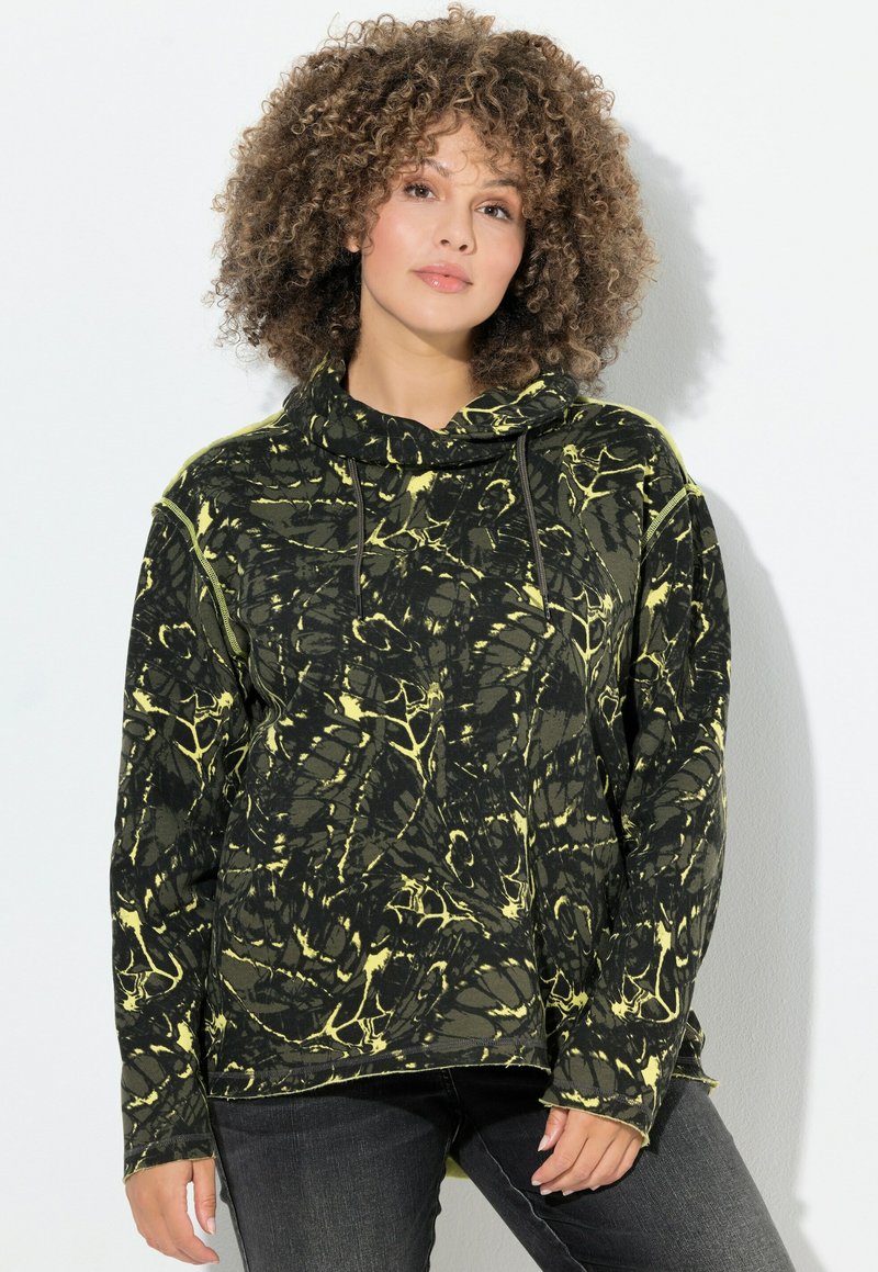 Sudadera con capucha en mármol negro y amarillo, de corte relajado, con mangas largas y un cordón en el cuello. Tejido texturizado.