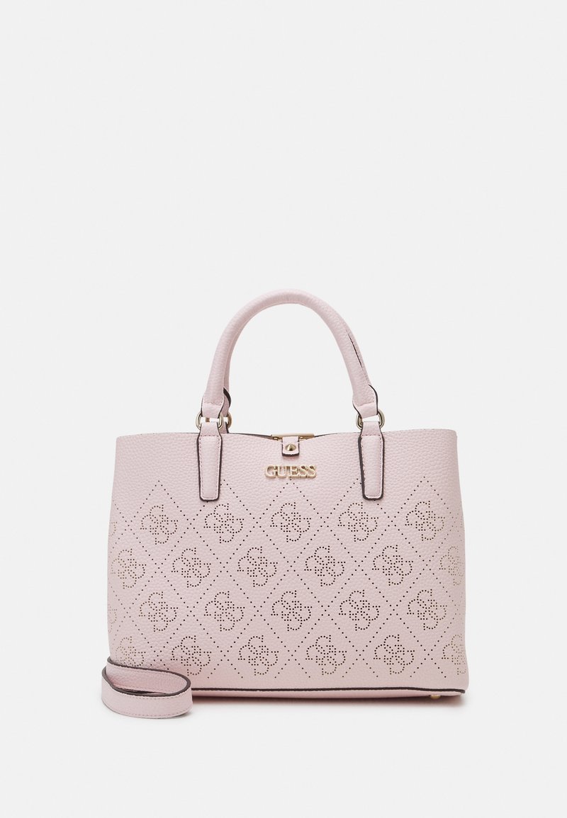 Sac à main rose clair avec motif losanges matelassés, double poignée, bandoulière amovible et logo Guess doré au centre avant.