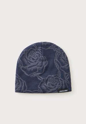 Berretto blu navy con motivo di rose grigio scuro e una piccola etichetta nera con la scritta "Santa Cruz" sul bordo.