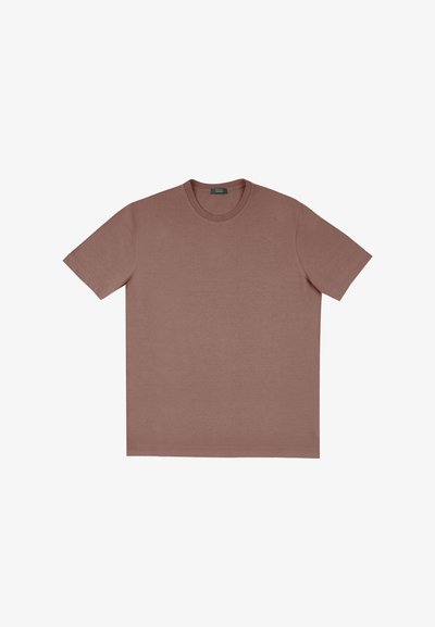 T-shirt à manches courtes en rose poussiéreux, fabriqué en coton doux, avec un col rond et une coupe décontractée, sans motifs ni embellissements visibles.