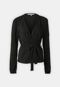 Blouse noire à manches longues avec plis verticaux, col en V et détail de taille nouée. Tissu doux avec une texture lisse.