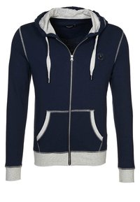 Marinblå zip-up hoodie med huva fodrad i grått, framfickor och kontrasterande sömmar. Tillverkad av mjukt tyg med en avslappnad passform.