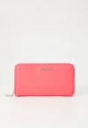 MEL ZIP AROUND - Portefeuille - light pastel red