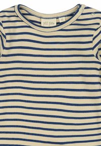 Gestreifter Langarm-Top in Creme und Marineblau, mit geripptem Struktur und Druckknöpfen an den Schultern für ein einfaches An- und Ausziehen.