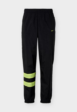 Nike Performance, Παντελόνι φόρμας - black/lemon