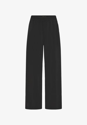 Schwarze weit geschnittene Hosen aus glattem Stoff. Mit elastischem Bund und ohne sichtbare Taschen. Einfaches und schlankes Design.