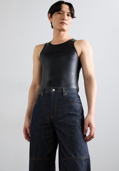 Helmut Lang CARPENTER - Avar lõikega teksad - raw indigo