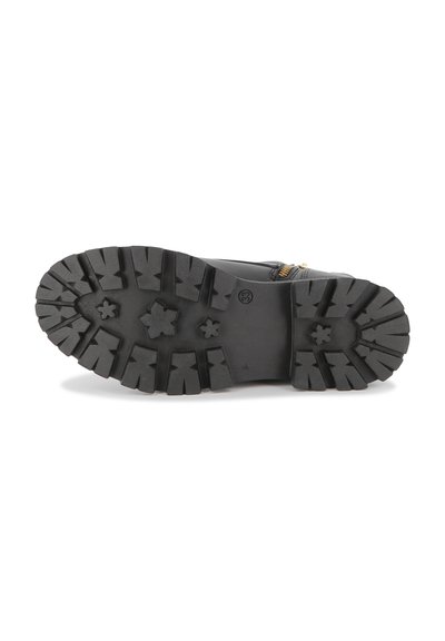 Semelle de botte en caoutchouc noir avec des profondeurs de nervures et des motifs multidirectionnels. Présente une finition lisse et un design de traction prononcé.