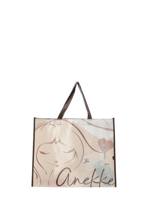 Borsa tote beige con manici marroni, con uno schizzo semplice del volto di una ragazza, un piccolo gatto, forme a cuore e la scritta "Anekke."